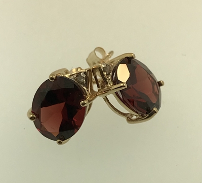Ladies 10KY Gold Oval Garnet & 2 Diamond Earrings 
